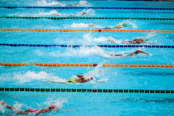 people doing swim race