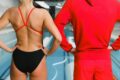 swimmers standing by the poolside